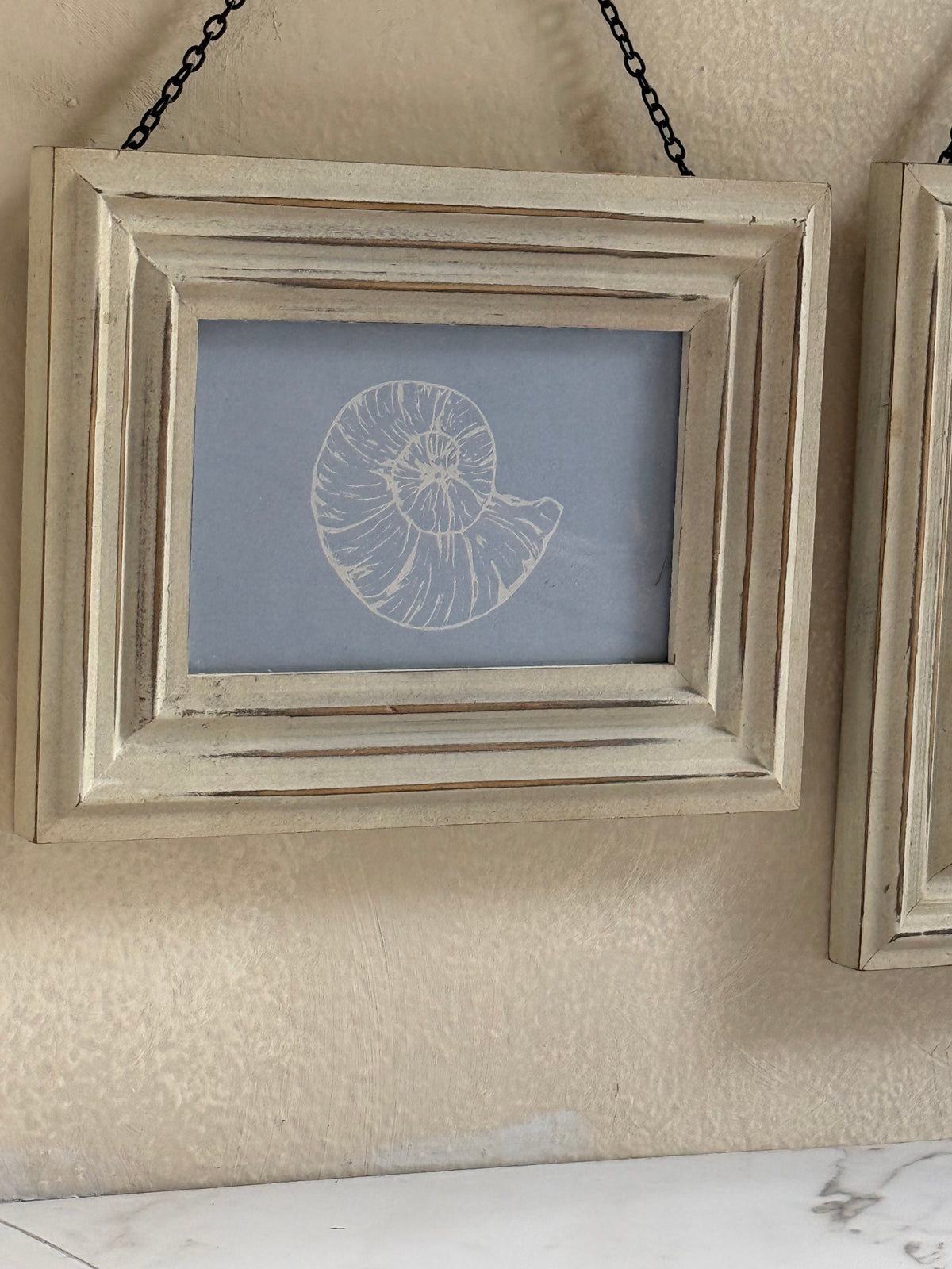 Pair of Hanging Frames with Coastal Prints